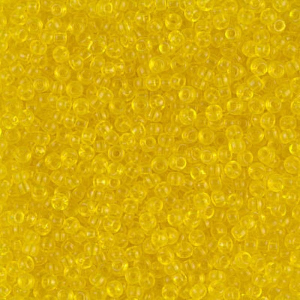 small, round, translucent yellow seed beads