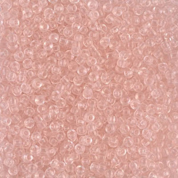 Close-up of light pink beads