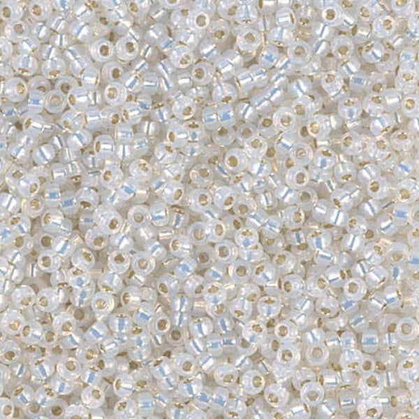Close-up of small white beads