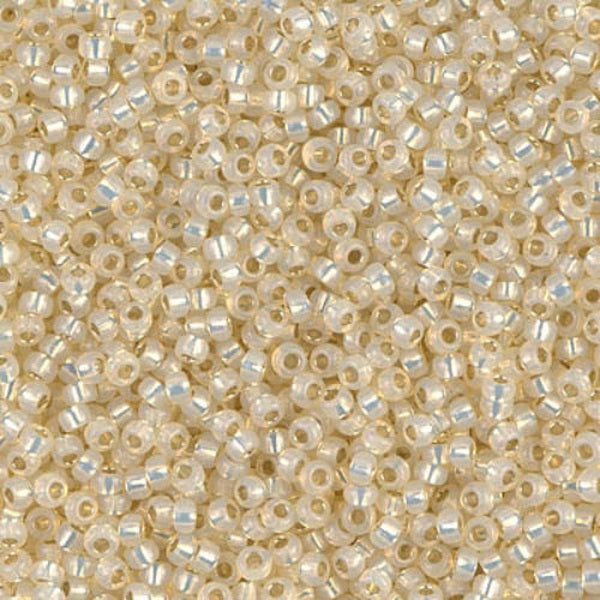 Close-up of small ivory beads