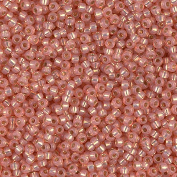 Close-up of small peachy pink beads 