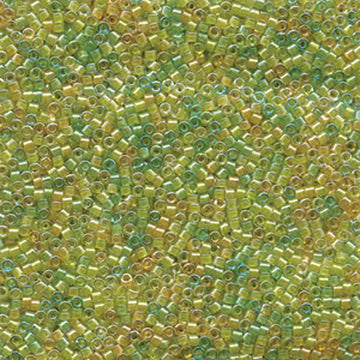 close-up of small green, yellow and amber glass beads.