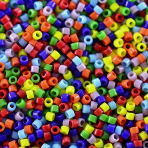 Close-up of colorful glass beads in various colors.
