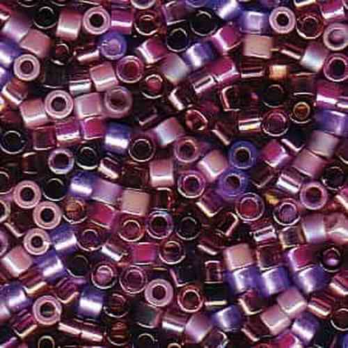 Close-up of 10/0 Delica beads in Lilacs Mix, showing iridescent purple and violet glass seed beads with metallic rose-gold luster