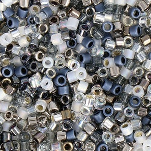 Delica 10/0 Apparition Mix beads showing matte white, iridescent clear, silver, and slate blue-grey cylindrical seed beads for beadwork