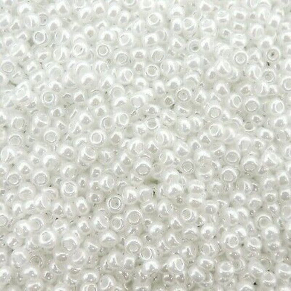 Close-up of small white beads